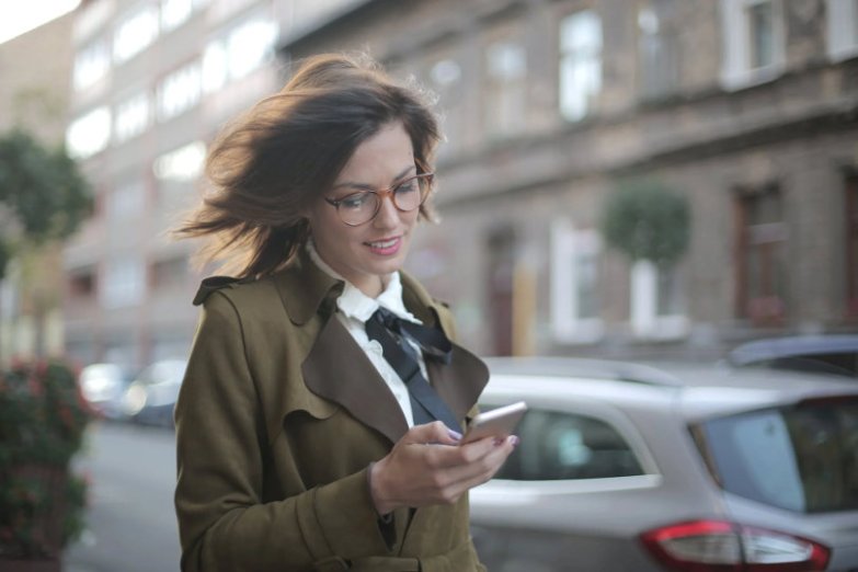 Businesswoman using new app